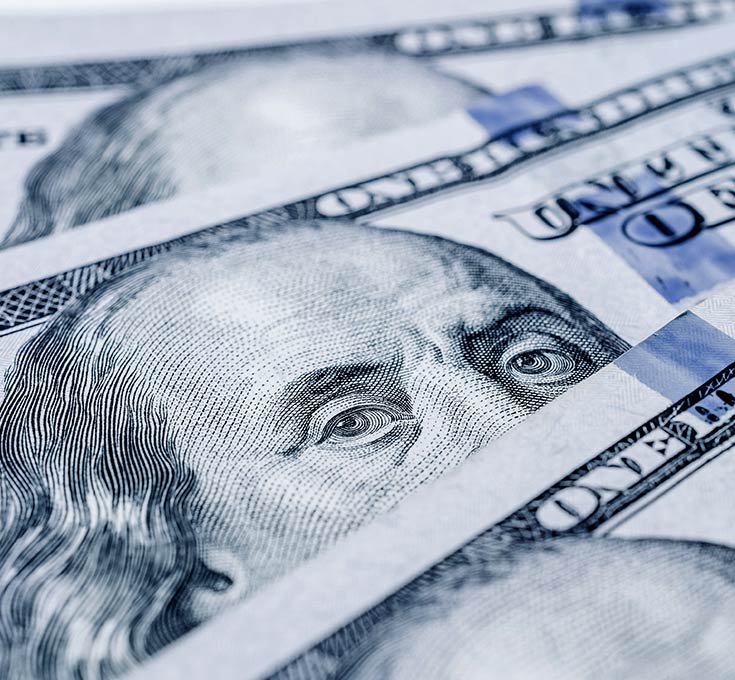 Gros plan sur des billets de 100 $ américains