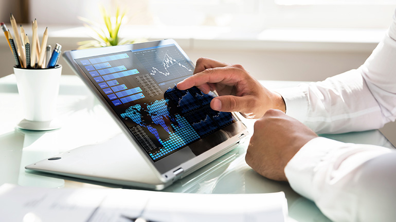 Close up of a person using a tablet